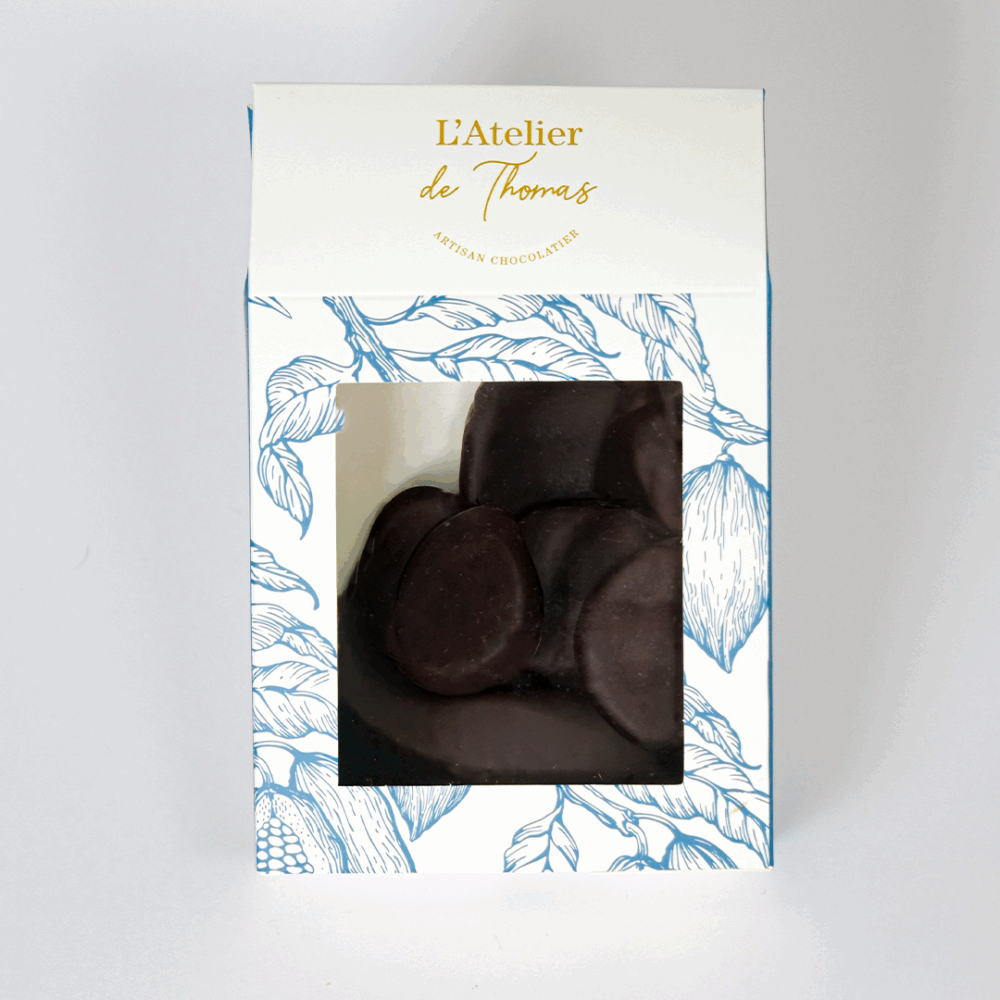 Sachet de gingembrettes artisanales de L’Atelier de Thomas – écorces de gingembre confites enrobées de chocolat noir 66 %.
