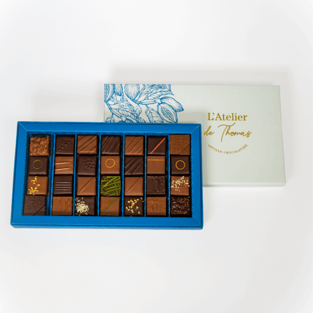 Boîte moyenne de 210 g de chocolats assortis artisanaux de L’Atelier de Thomas.